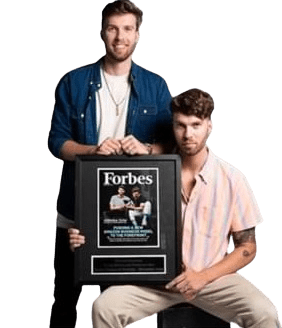 mikkelsen twins showing off their forbes feature